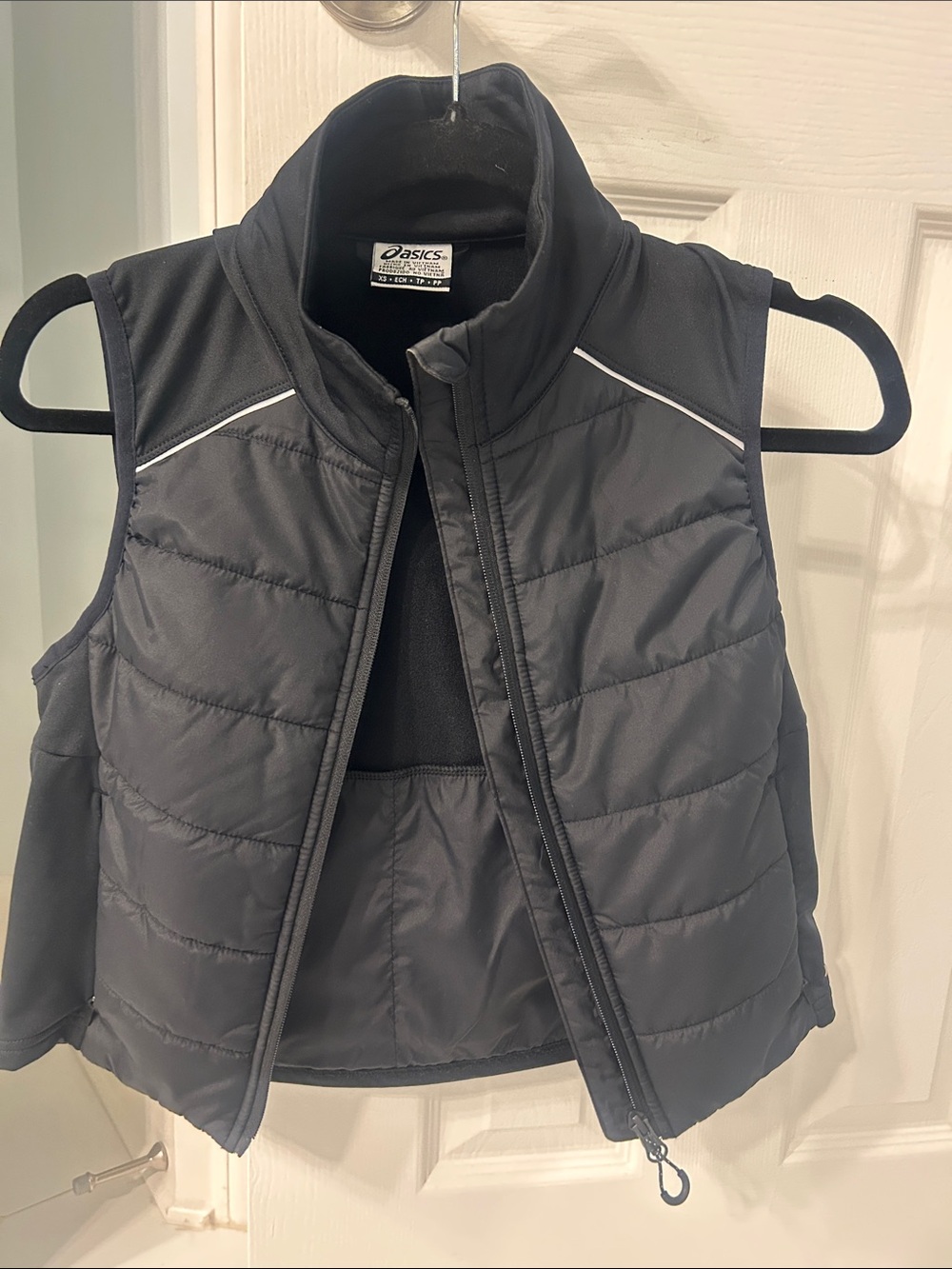 Asics Black Quilted Kids Vest with Reflective Trim